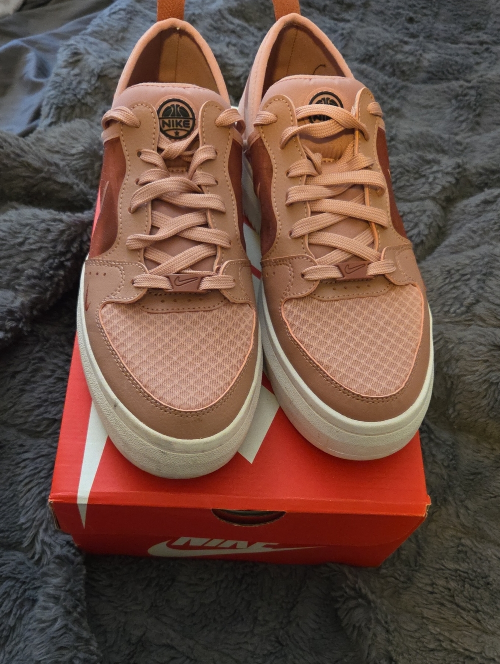 Nike Women’s Low-Top Sneakers in Rose Pink and Rust